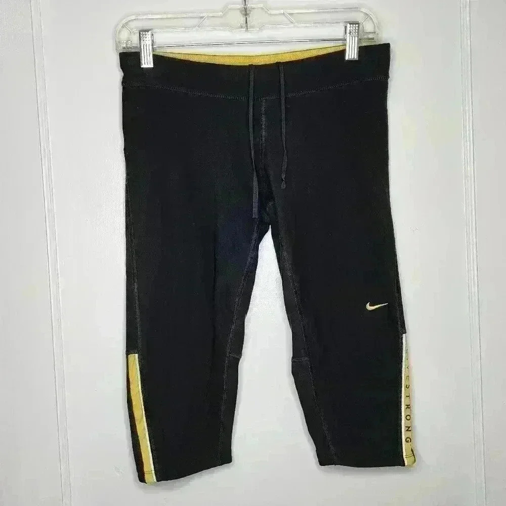 Size Medium Nike Dri-Fit Livestrong Capri's Black / Yellow Logo